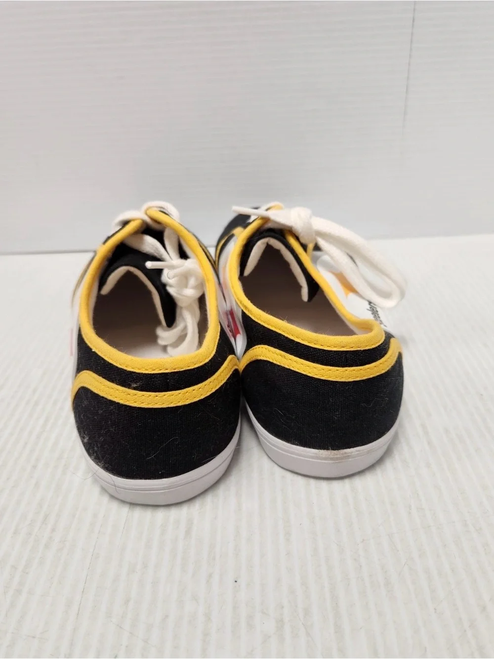 NFL Pittsburgh Steelers Black and Gold Low-Top Sneakers